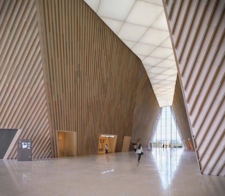 The architectural model showcases the seamless integration of terracotta baguettes and louvers, illustrating their functional and aesthetic contributions to the building’s design.