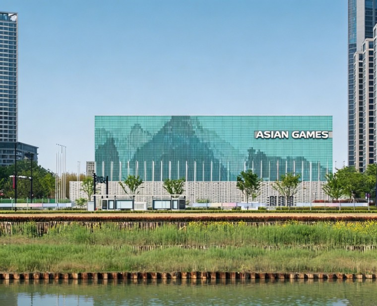 Public building wall decoration with green clay baguettes at Asian Games Village